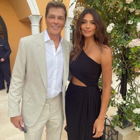 Patrick Whitesell and Pia Loyola Whitesell posing for a photo shoot